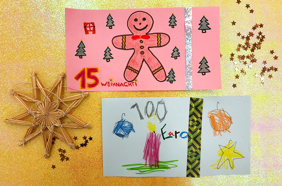 Zwei von Kindern weihnachtliche selbst gestaltete Banknoten